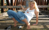 Pantyhose Angel 303519 Outdoor With Angel In Jeans And Suntan Pantyhose
