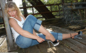 Pantyhose Angel 303519 Outdoor With Angel In Jeans And Suntan Pantyhose
