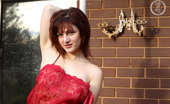 Girls Out West Leonie Brick Wall 303864 Leonie Is A Very Busty Italian Girl- A Rounded Natural E-Cup With A Tiny Frame And Big Personality. Her Creamy Complexion Compliments Her Deep Brown Eyes.