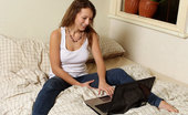 Girls Out West Daina Laptop 303960 Delicious Daina Is Back, Lounging Around In Her Big Cream Bed Playing Around On Her Laptop. Like Many Of Us, She Has Trouble Staying Focused On The Task At Hand In This High-Tech, Digital Day And Age. Her Attention Wanders. She Starts Clicking Around.