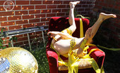 Girls Out West Lady Disco Ball Angled Up In Yellow Tape, Lady Takes A Wank , Sprawling Over A Luxurious Red Velvet Armchair, A Giant Disco Ball Throws Flecks Of Light Across Her Petite Body As The Golden Vibrator Slips In And Out Of Her Succulent Hairy Pussy.
