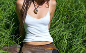 Girls Out West Zaria In Green Grass 304018 Hippy Chick Zaria Spreads Out For Some Sunshine On Her Beautiful Body. Lying In The Green Grass, So Innocent, So Desirable... She Looks Like A Angel With Dreadlocks.