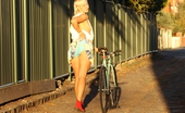 Girls Out West On Ya Bike 304190 Steel Likes To Ride Her Bike Around Town,Saving Fuel,Burning Energy,And It Keeps Her Fit. Her Killer Legs Look Awesome As She Peddles Along The Bike Path.