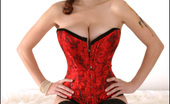 Pinup Files 305576 Danielle Riley Vol12 Set02 Danielle Poses In Red Classic Corset And Stockings
