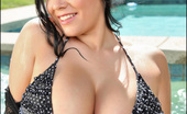Pinup Files Satinee Capona 305688 Satinee Capona Vol. 3 Set 1 Busty Big Boobs All Wet! Satinee Gets Her All-Natural Big Tits Packed Into This Tiny Black Bikini, Causing Them To Bulge Out On All Sides As The Bikini Top Can Barely Handle Them And All Their Incredible Busty Goodness. We Love
