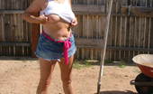 TAC Amateurs Granny Working In The Yard Working In The Yard Can Be Hot Work - Cooling My Tits Felt Soooo Good - My Daisy Duke Shorts Were So Tight Against My Cr
