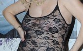 TAC Amateurs Black & See Through Dressed In A See Thru Top, A Skirt And Panties Slowly Strip Down To Just The See Thru Top Flashing Tits And Pussy.