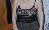 TAC Amateurs Black & See Through 315138 Dressed In A See Thru Top, A Skirt And Panties Slowly Strip Down To Just The See Thru Top Flashing Tits And Pussy.
