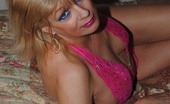 TAC Amateurs Pink Nighty Strip 315433 Dimonty Is On Her Bed Wearing Her New Pink Nighty But She Knows Her Fans Want To See Her Lovely Large Breasts And Wet Cu
