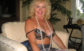 TAC Amateurs Black Shiny Dress White Feathers 316878 
