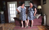 TAC Amateurs Matching Sundresses 317068 Girdlegoddess, And Mistress Sue In Our Matching Sexy Sun Dresses. So Naughty And So Nice We Are. That Mistress Has A Sur
