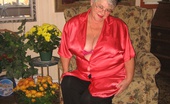 TAC Amateurs Red Satin Shirt 317299 Girdlegoddess, Is Sexy And Relaxed At Home In Her Red Satin Shirt And Pink Hi Heels. Cum And See As She Takes It Off, Sh
