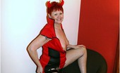 TAC Amateurs Red Devil 317701 I Am A Horny Little Red Devil With My Black Fishnets Flashing.
