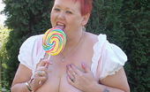 TAC Amateurs Lollipop 317777 Out In The Sun With My Country Gal Frock On Sucking A Huge Lolly
