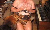 TAC Amateurs Sexy GirdleGodess By The Piano This Mature MILF Would Love To Play With Your Hard Organ.
