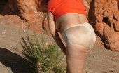 TAC Amateurs White Skirt 318793 Back In The Desert In Pantyhose, Mini-Skirt And Sweater Top. Just Can'T Keep Those Clothes On
