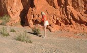 TAC Amateurs White Skirt 318793 Back In The Desert In Pantyhose, Mini-Skirt And Sweater Top. Just Can'T Keep Those Clothes On
