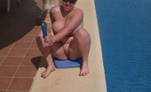 TAC Amateurs Barby Gets Hot By The Pool 318875 See Me Fucking Myself Hard And Fast At The Side Of Our Private Pool For Our Neighbours To See...
