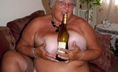 TAC Amateurs Holiday Bottle Wank 319149 When A Girl Is Away On Holiday And Sex-Starved What Is She To Do This Grandma Knew What To Do Get Out The Wine Bottle
