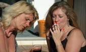 TAC Amateurs Devlynn & Irene Sneak Smoke 319674 A Boring Party Can Suddenly Get Livelier After Sneaking Out Back And Finding Irene To Share A Smoke And Glass Of Wine Wi
