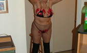 TAC Amateurs Sexy Little Outfit 319866 Here'S A Sexy Little Outfit - Pantyhose With Thigh High Boots, And A Little Bit Of Leather Bra And Thong Panties - Lots
