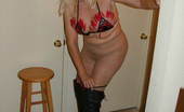 TAC Amateurs Sexy Little Outfit 319866 Here'S A Sexy Little Outfit - Pantyhose With Thigh High Boots, And A Little Bit Of Leather Bra And Thong Panties - Lots
