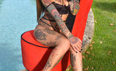 Hot Legs and Feet Lauren 328921 Inked Babe Lauren Poses For Us At The Pool
