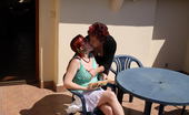 Old And Young Lesbian 333024 Horny housewife playing with a lesbian teen on the balcony
