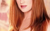 Danni.com Julia Hayes 334596 Hot Redhead Julia Hayes Snaps Her Eyes On You While Removing Her Revealing Lingerie
