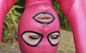 House Of Taboo Latex Lucy 342167 Babe In Pink Latex Sucking Cock While Hanging Upside Down
