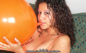 Cute Latina Talia 343526 Cute Latina Blowing Up A Huge Balloon
