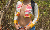 Joon Mali Blazing Trail NN 343763 Sweet Joon Mali Lifts Her Skirt And Flashes Panties Outside
