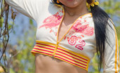 Joon Mali Blazing Trail NN 343763 Sweet Joon Mali Lifts Her Skirt And Flashes Panties Outside
