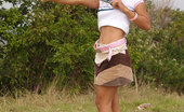 Joon Mali SlingShot NN 343816 Asian Teen Flashes Cute Panties And Bubble Buns Outdoors
