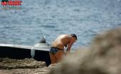Upskirt Collection
 344332 Bikini voyeur man working on beach
