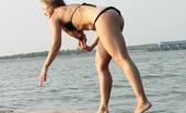 Upskirt Collection
 344621 Bikini thong hiding between booties