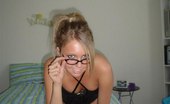 Upskirt Collection
 Four eyed blonde in high golfs and black lingerie poses