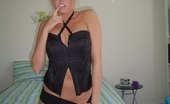 Upskirt Collection
 346942 Four eyed blonde in high golfs and black lingerie poses