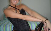 Upskirt Collection
 346942 Four eyed blonde in high golfs and black lingerie poses