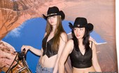 Upskirt Collection
 346985 Two frisky girls in cowboy hats slap asses in jeans shorts
