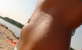 Upskirt Collection
 Sheer wet bikini uncovers nips and cameltoe