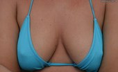 Upskirt Collection
 347216 Bikini thongs look great on those wet booties