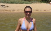 Upskirt Collection
 347216 Bikini thongs look great on those wet booties