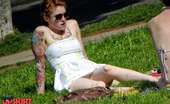 Upskirt Collection
 347921 Tattooed redhead voyeured in a park. Sexy upskirt