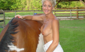 Real Tampa Swingers .Com0 348692 Sexy Soccer Mom Tracy Takes Nude Photos On A Member'S Ranch
