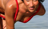 Bikini Dream Lisa 363717 Babe Wades In The Ocean In Her Red Sling Bikini
