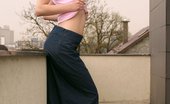 Only Cuties Faith - On The Roof0 369056 Fiery Redhead Flirtatiously Strips And Poses On Balcony
