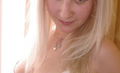 18 And Busty Cindy 385090 Sweet Blonde Angel With Big Boobs Getting Nude And Exposing Her Pink Pussy
