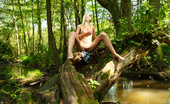 18 Stream Danielka 387432 Danielka Loves To Go Out To The Stream Behind Her House Just As The Sun Is Going Down And Sit By The Water. That`S Not All Danielka Likes To Do Though, She Just Can`T Keep Her Fingers Off Her Tight Body! As She Sits There By The Water In The Warm Afternoo