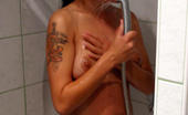 Big Breasts Sex 404029 Heavily Tattooed Babe Taking A Nice Shower
